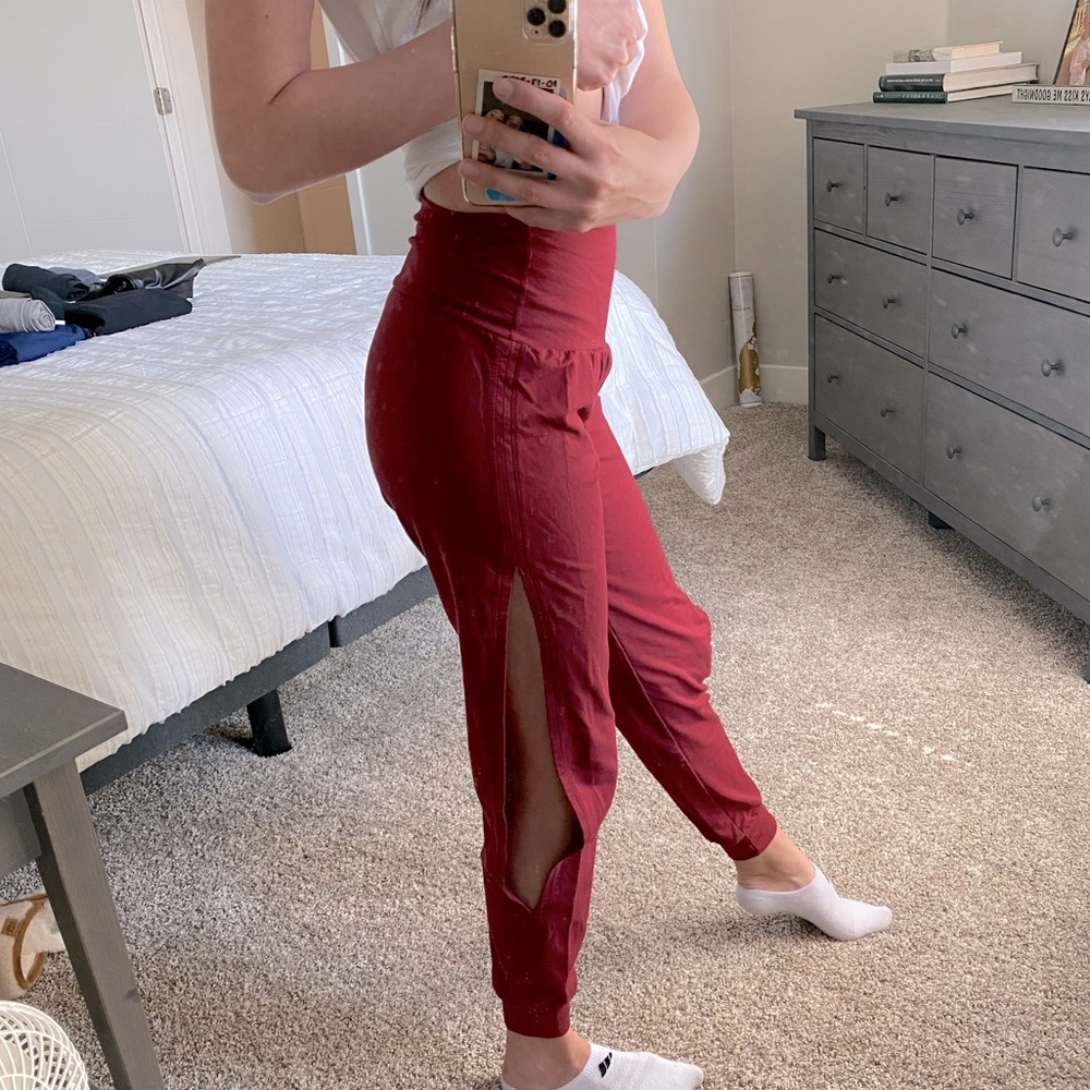 Red yoga pants, slit on both sides